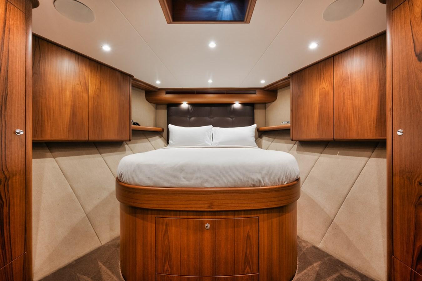 a bed in a room aboard OWL'S NEST Yacht for Sale