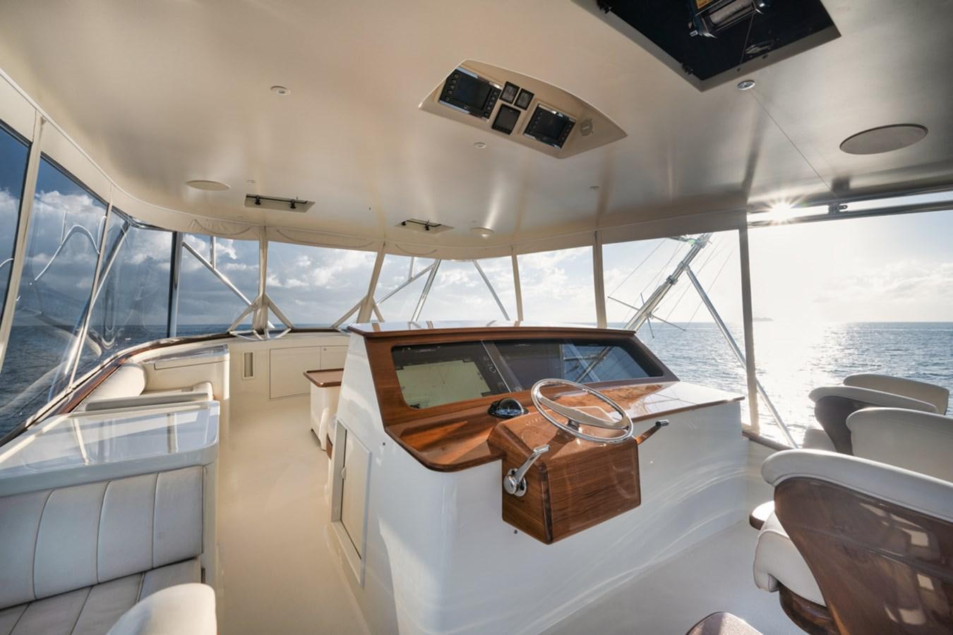 a boat with a wooden desk aboard OWL'S NEST Yacht for Sale