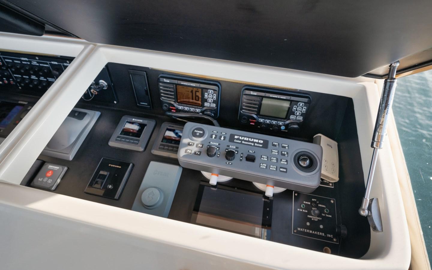 a close-up of a car stereo aboard OWL'S NEST Yacht for Sale
