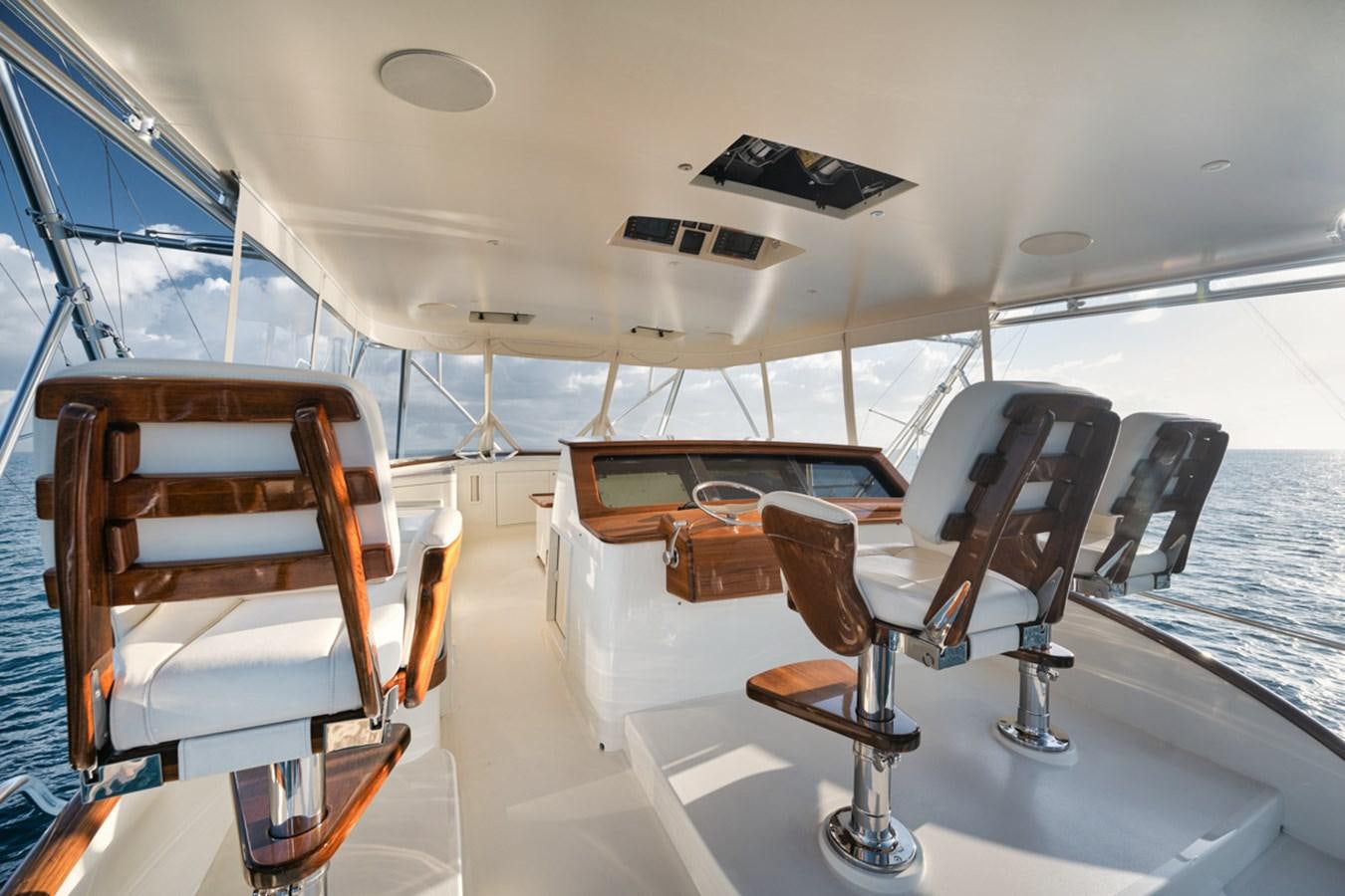 a boat with a desk and chairs aboard OWL'S NEST Yacht for Sale