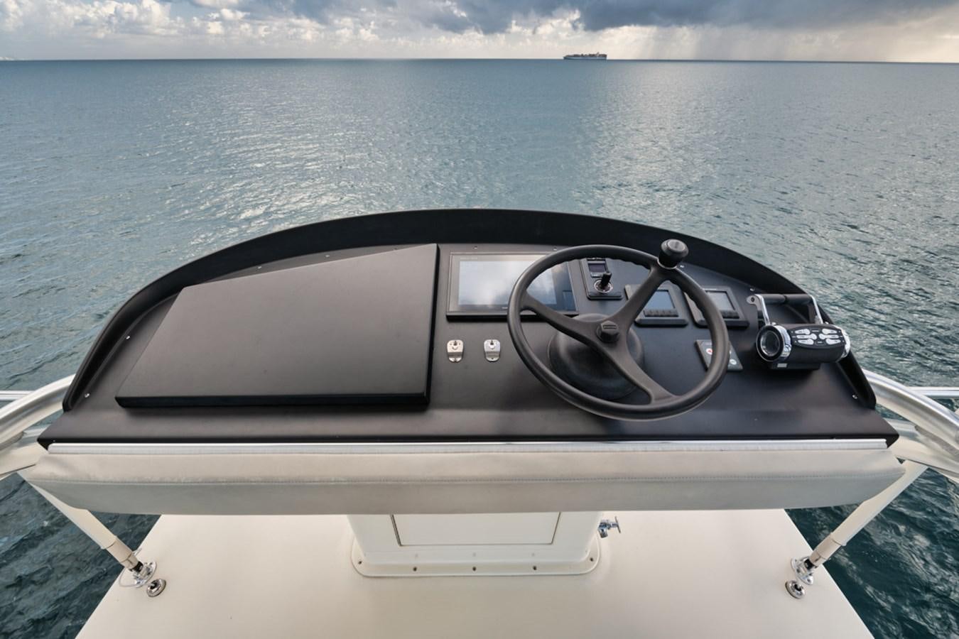 a steering wheel on a boat aboard OWL'S NEST Yacht for Sale