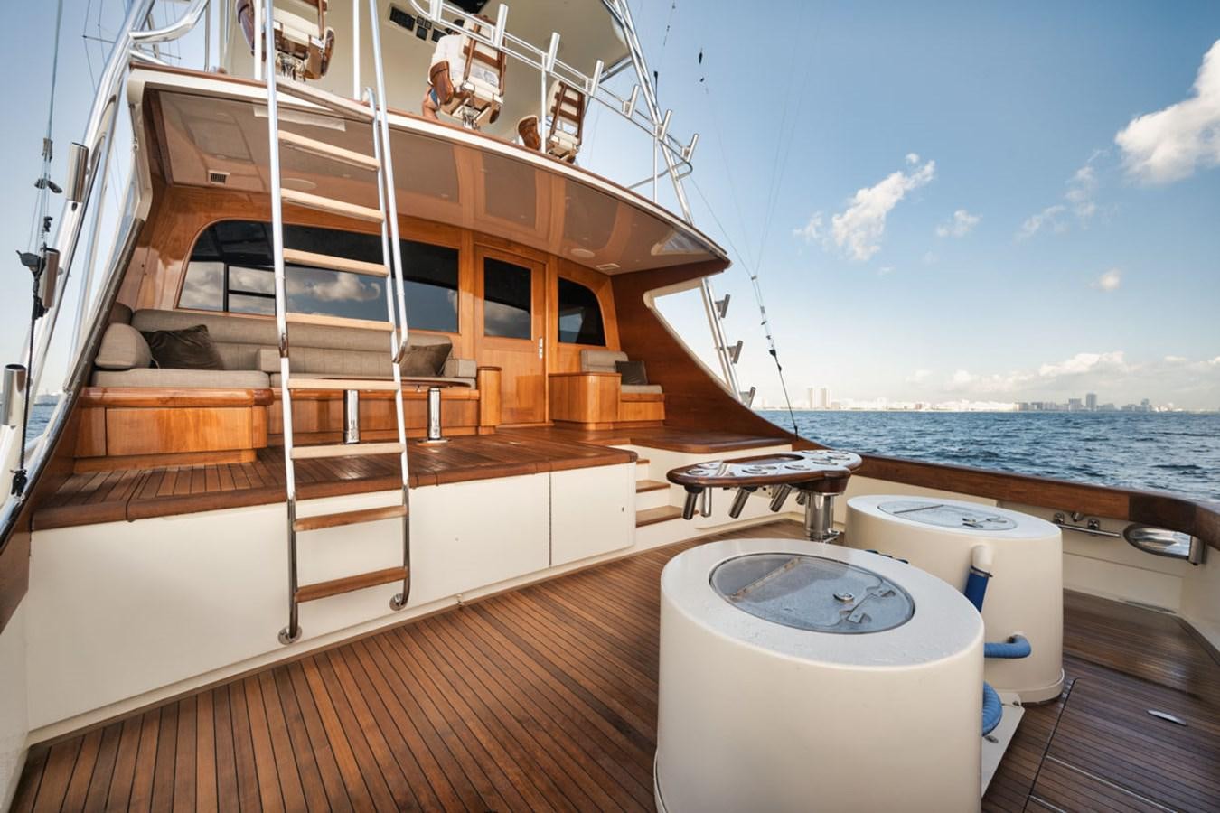a boat on a deck aboard OWL'S NEST Yacht for Sale