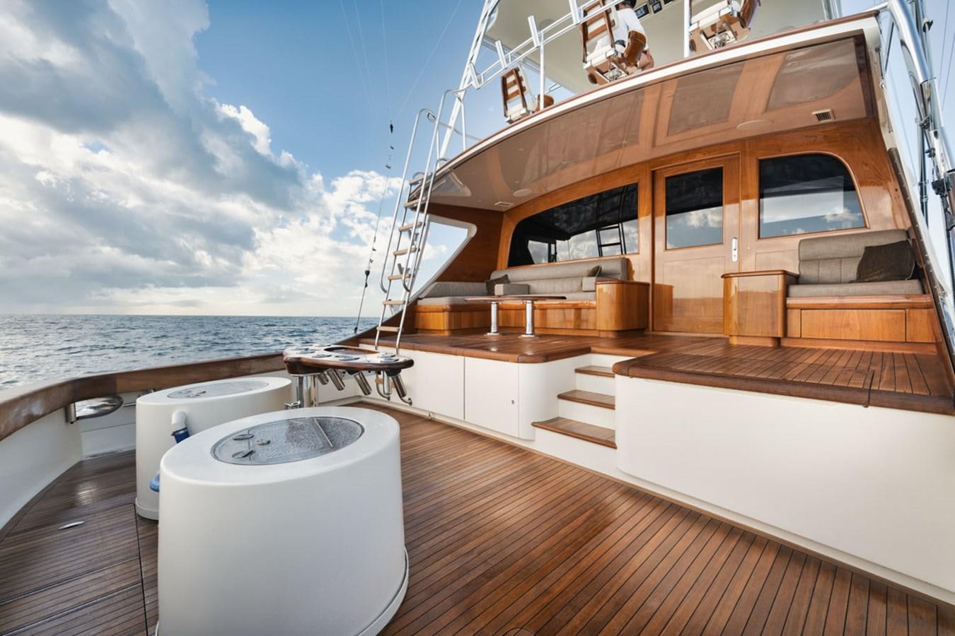 a large white tub on a deck overlooking the ocean aboard OWL'S NEST Yacht for Sale