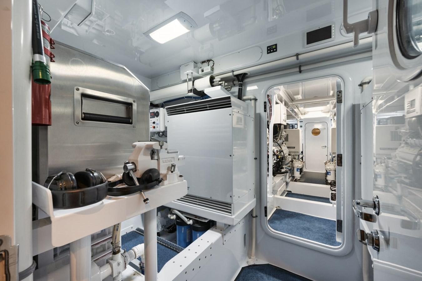 a room with a machine aboard OWL'S NEST Yacht for Sale