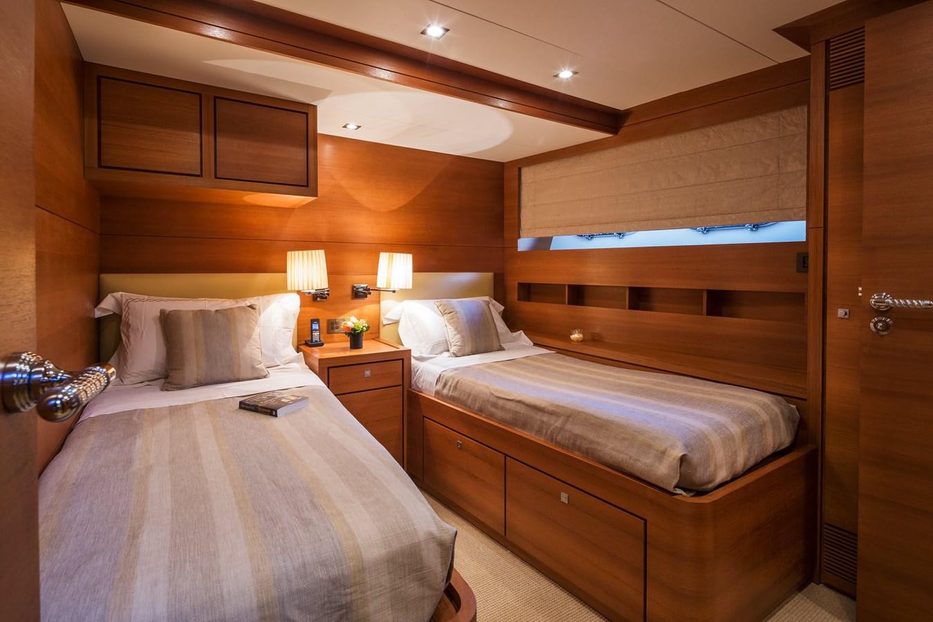a couple of beds in a room aboard WATER TOY III Yacht for Sale