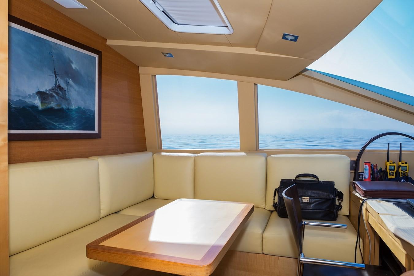a room with a desk and a tv aboard WATER TOY III Yacht for Sale