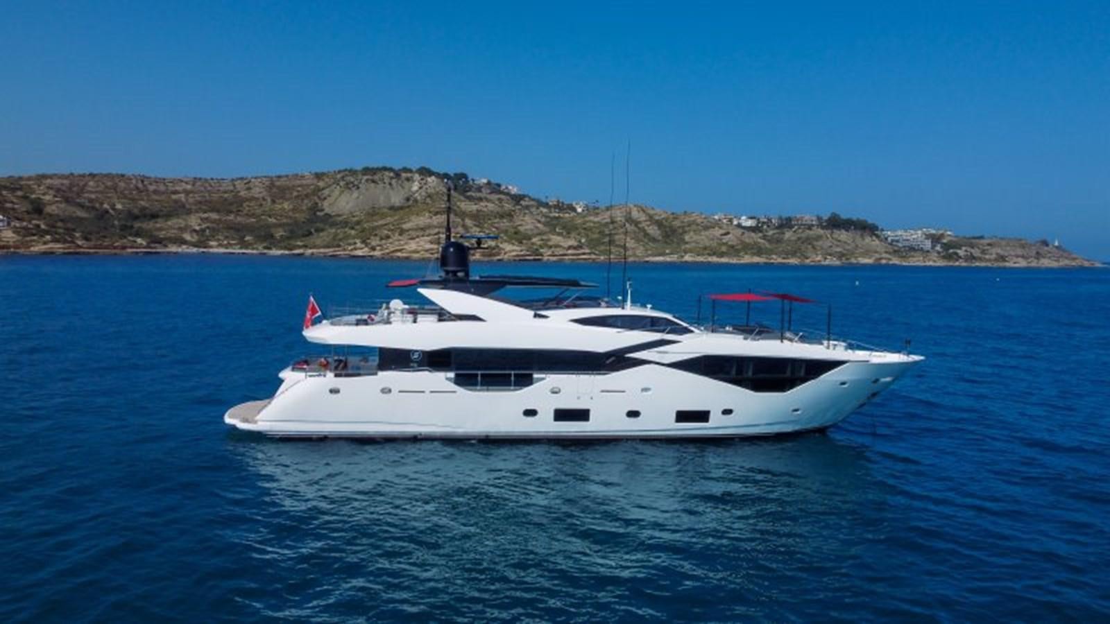 a white boat in the water aboard SURVIVOR 2 Yacht for Sale