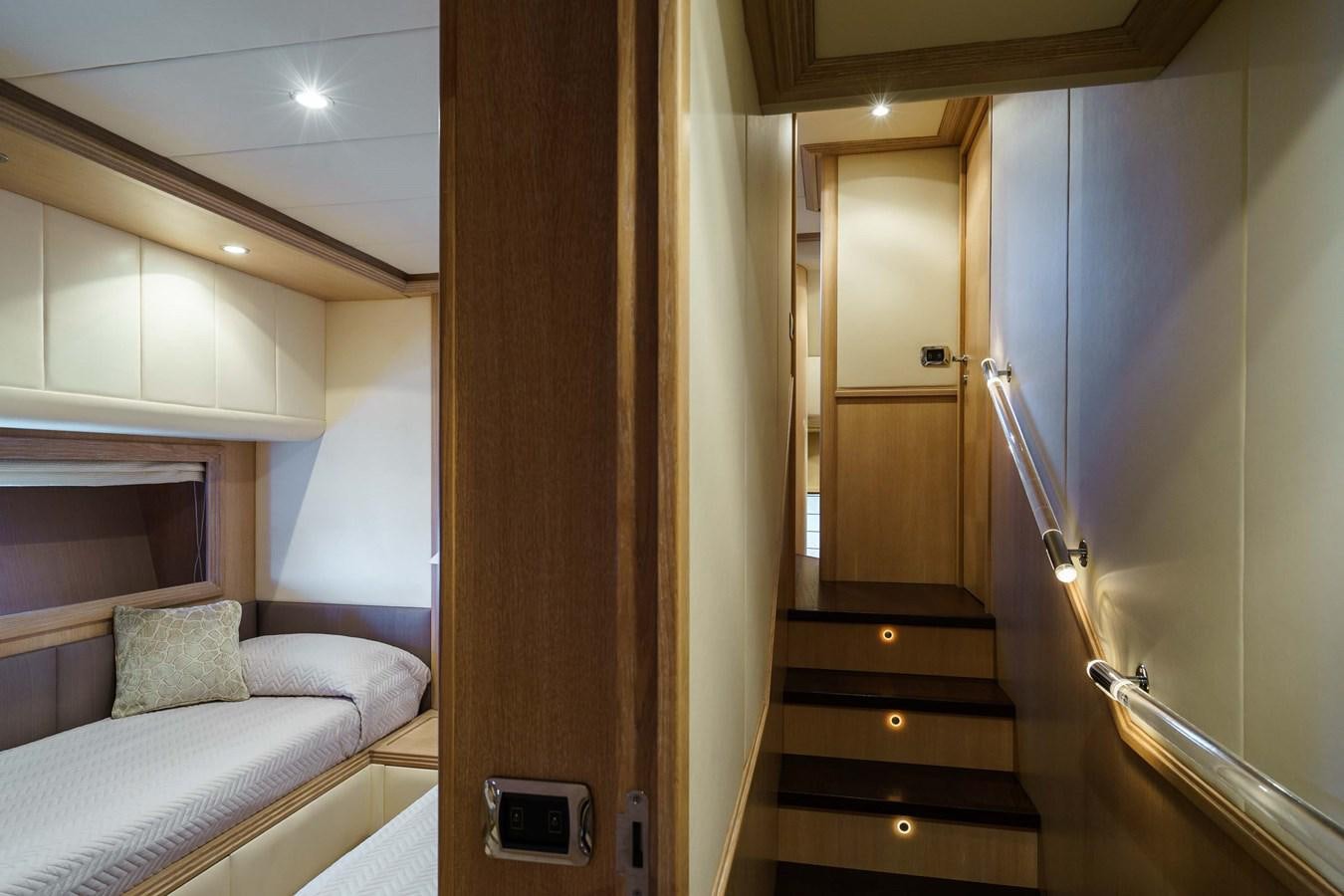 a room with a bed and a closet aboard ALLIE Yacht for Sale