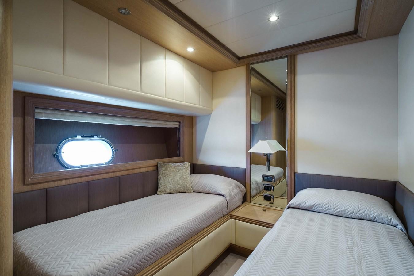 a room with two beds aboard ALLIE Yacht for Sale