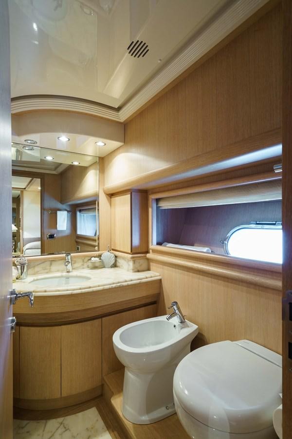 a bathroom with a sink and a toilet aboard ALLIE Yacht for Sale
