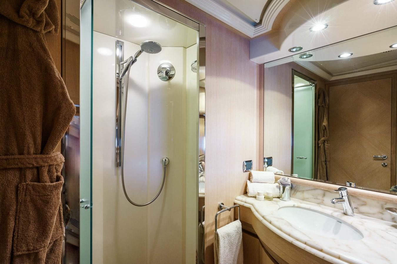 a bathroom with a large mirror aboard ALLIE Yacht for Sale