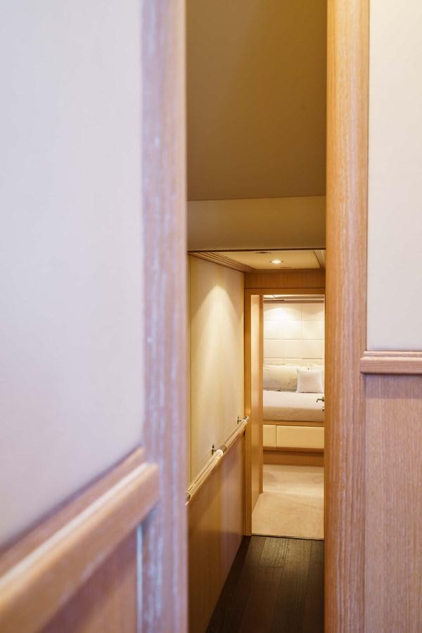 a hallway with a couple of beds aboard ALLIE Yacht for Sale
