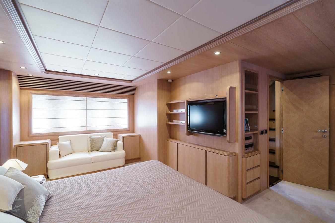 a bed and a television in a room aboard ALLIE Yacht for Sale