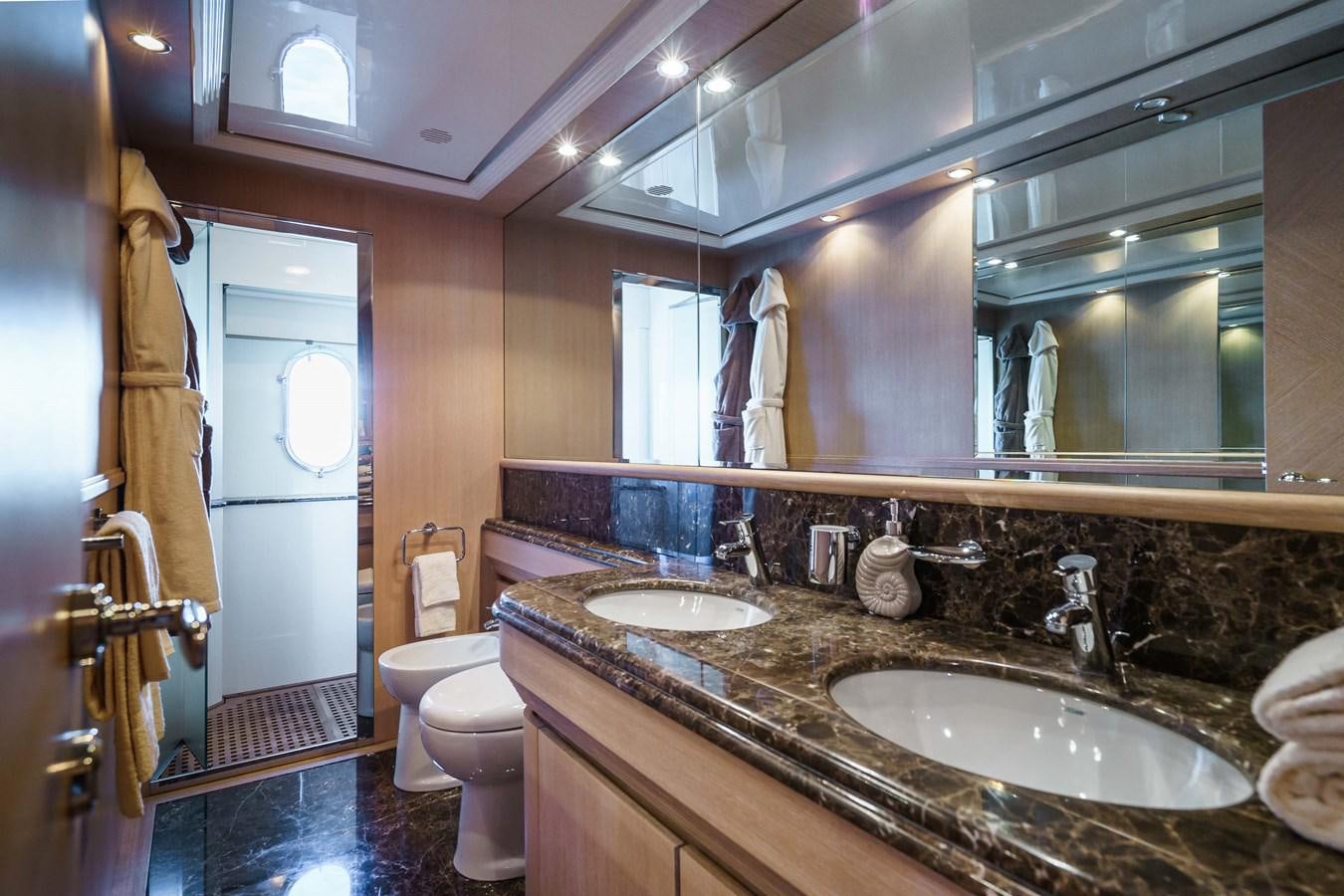a bathroom with a sink and a toilet aboard ALLIE Yacht for Sale