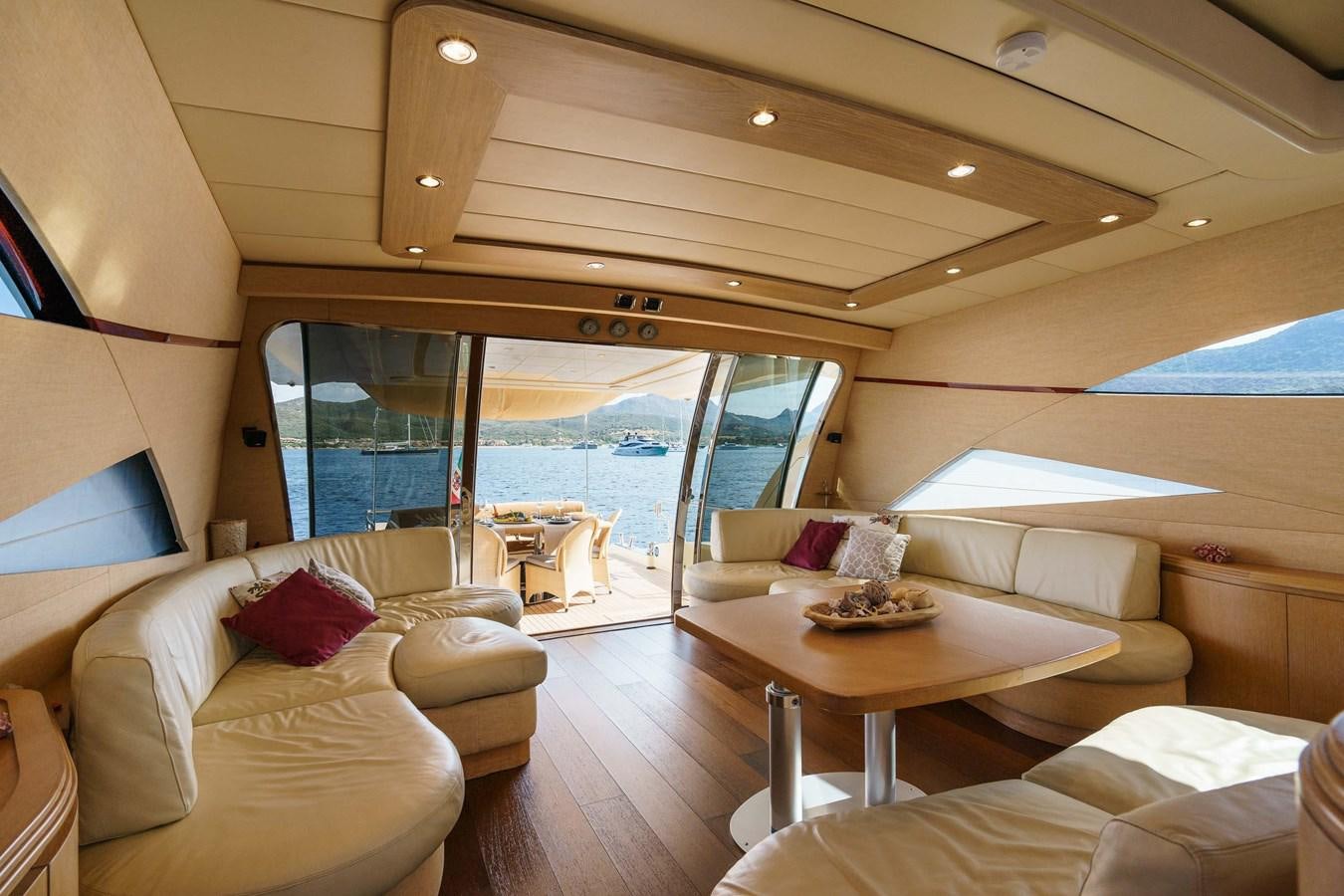 a living room with a large window aboard ALLIE Yacht for Sale