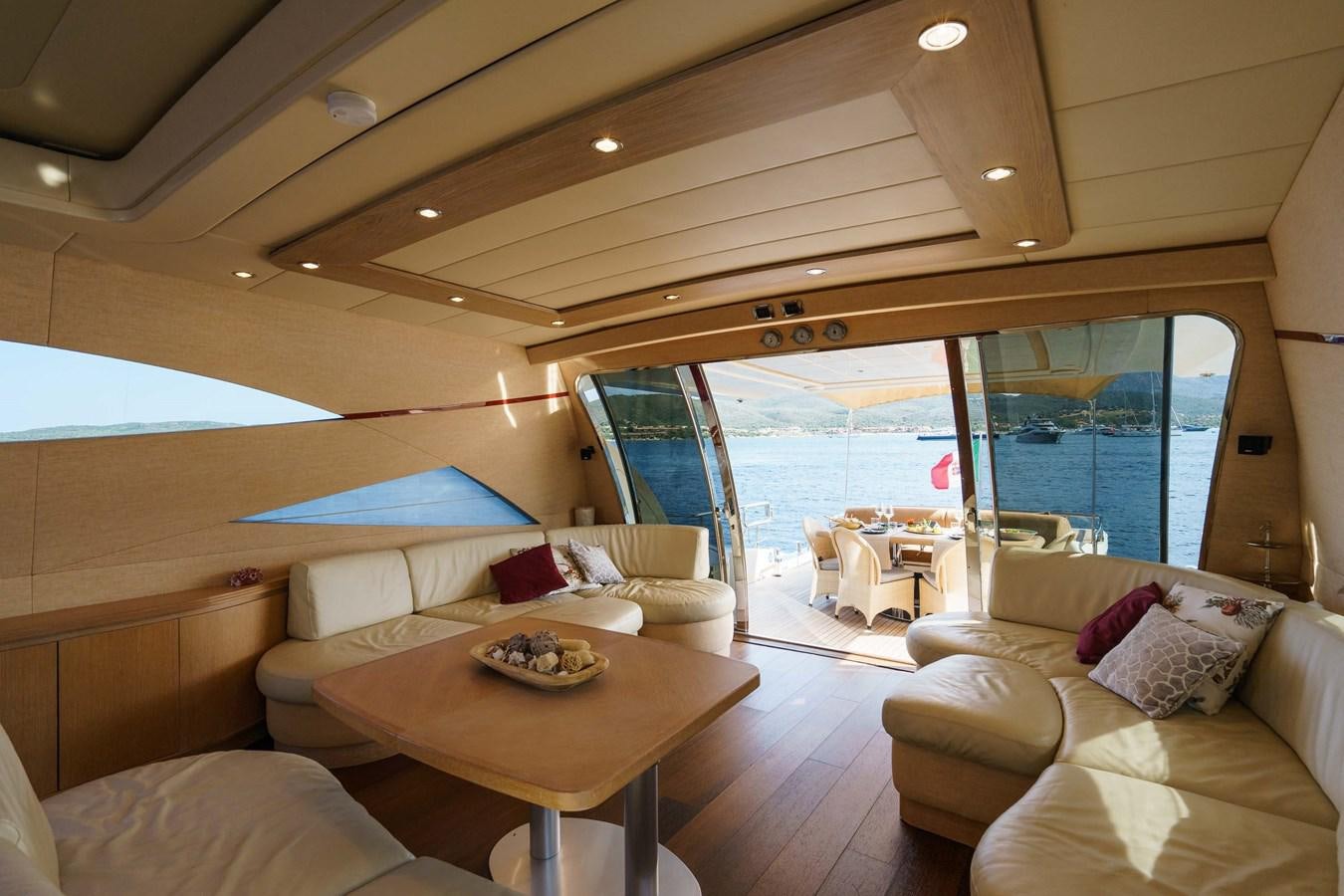 a living room with a large window aboard ALLIE Yacht for Sale