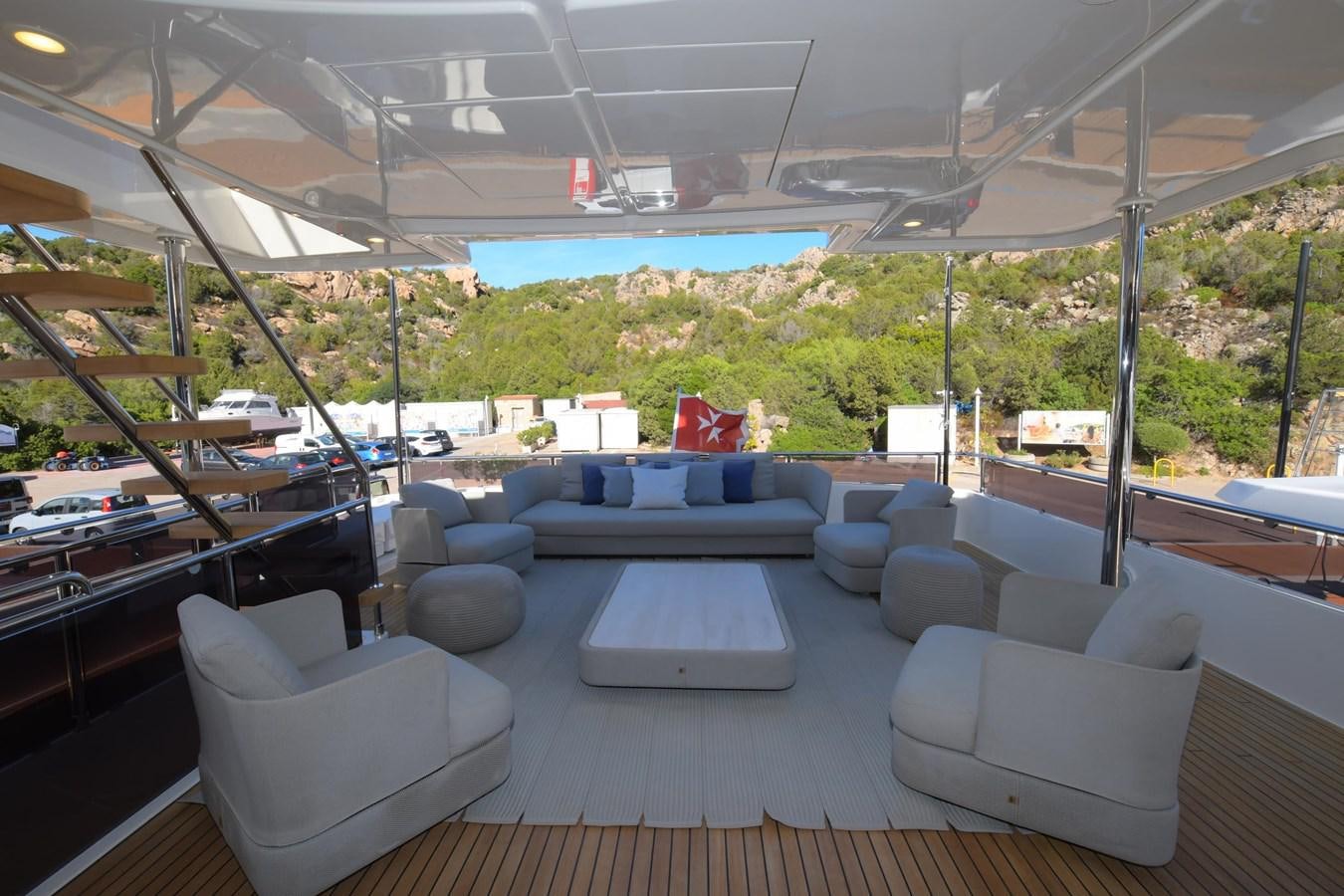 a room with a table and chairs aboard VICTORIA VIENNA Yacht for Sale