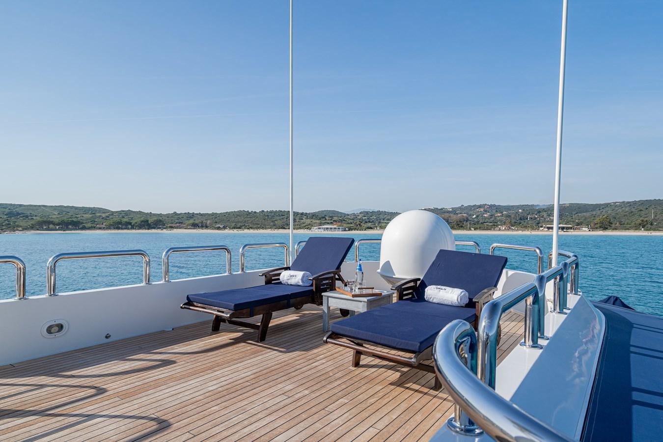 a boat on the water aboard AQUARIUS IV Yacht for Sale