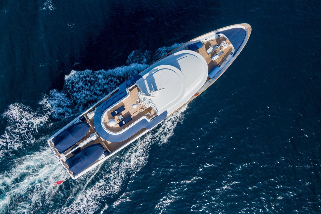 a small boat in the water aboard AQUARIUS IV Yacht for Sale