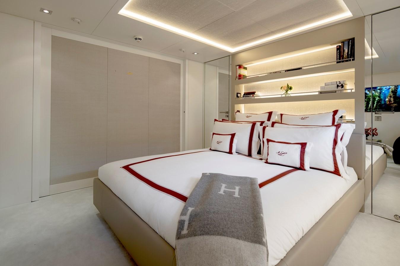 a bed in a room aboard MRS L Yacht for Sale