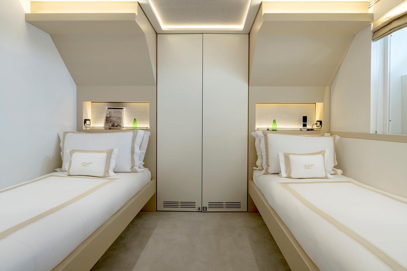 a room with two beds aboard MRS L Yacht for Sale