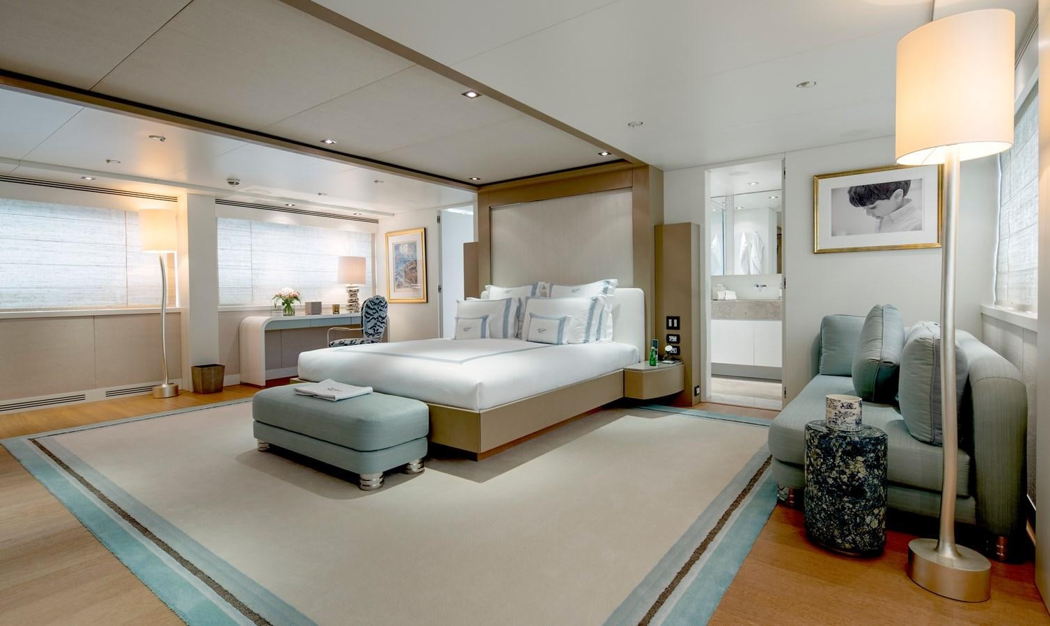 a large white bed in a room aboard MRS L Yacht for Sale