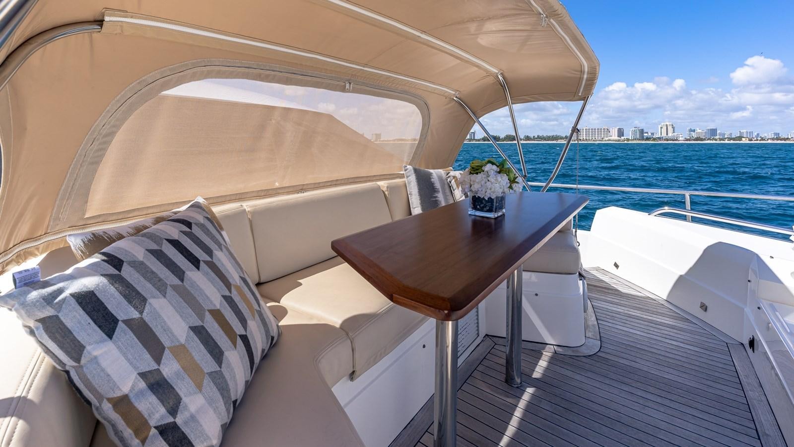 a table on a boat aboard BELLA RONA Yacht for Sale