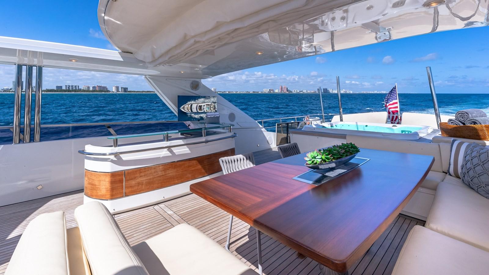 a table on a boat aboard BELLA RONA Yacht for Sale