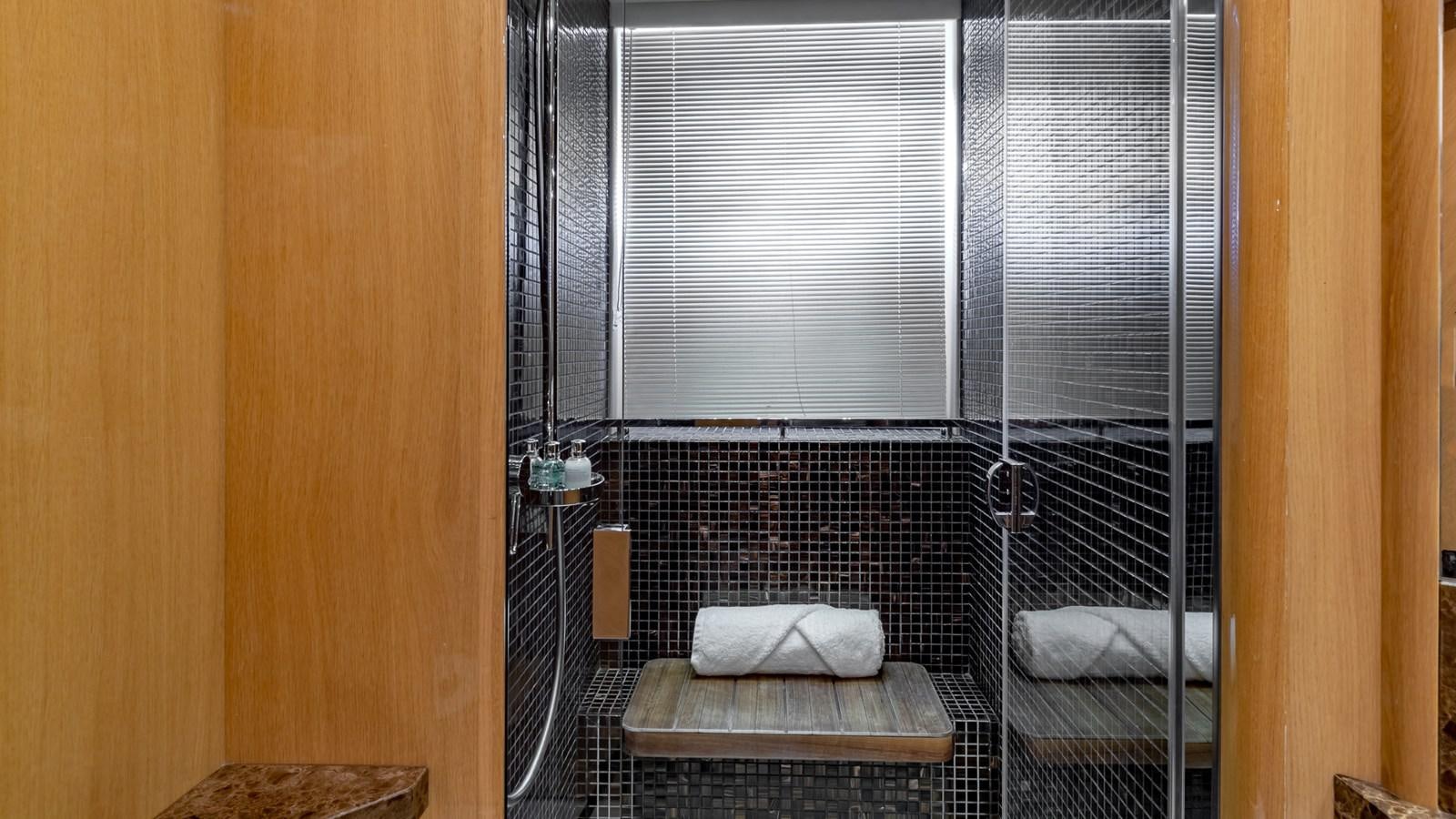 a bathroom with a tub aboard BELLA RONA Yacht for Sale