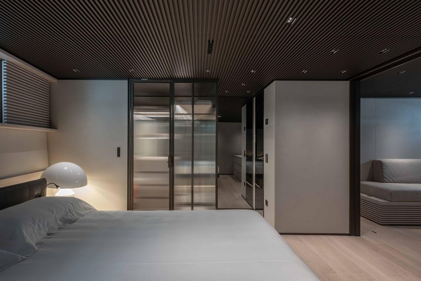 a room with a bed and a window aboard SP110-03 Yacht for Sale