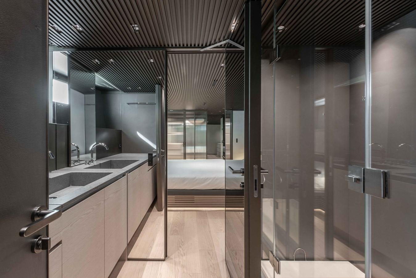 a bathroom with a large mirror aboard SP110-03 Yacht for Sale