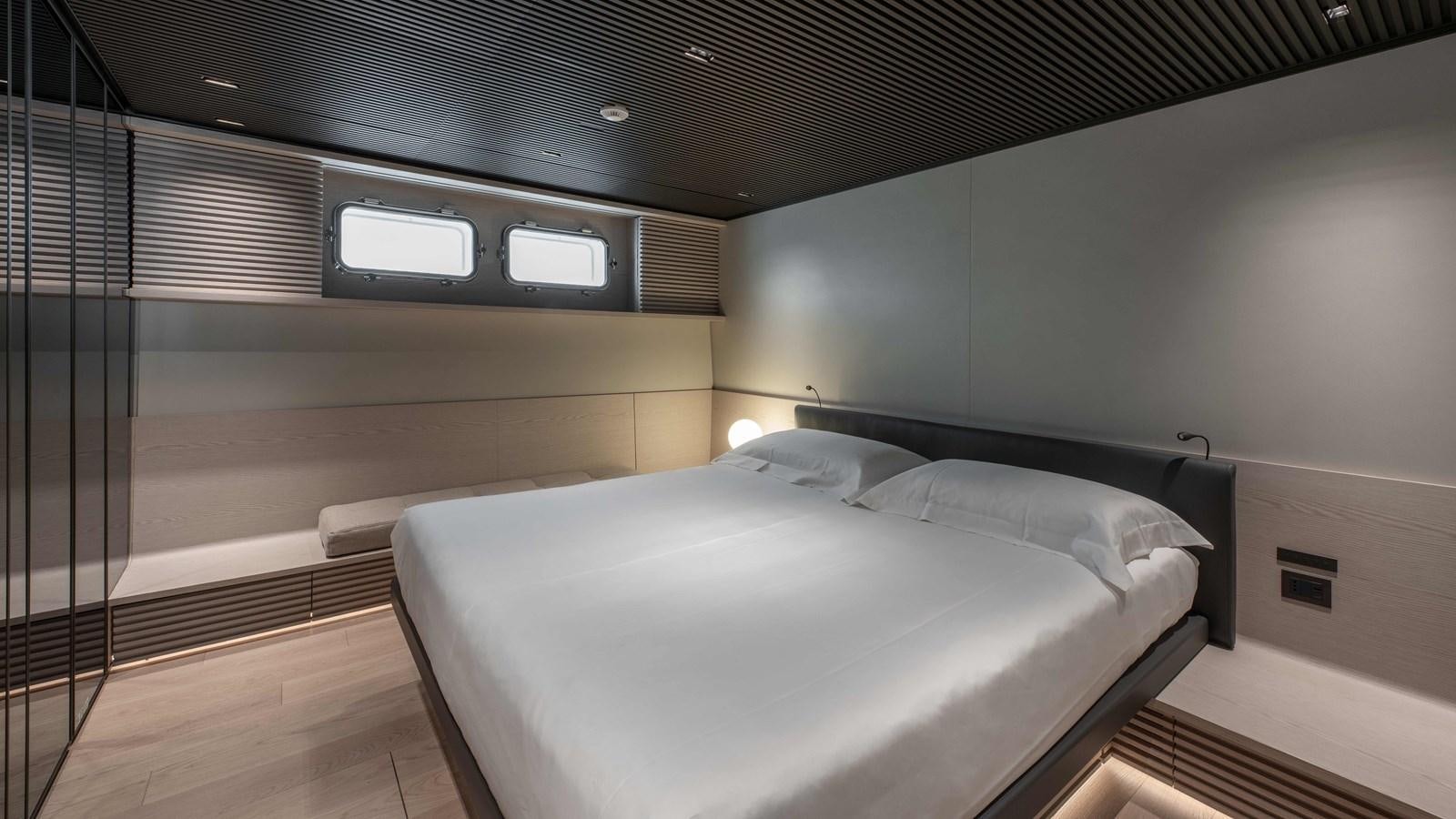 a bed in a room aboard SP110-03 Yacht for Sale