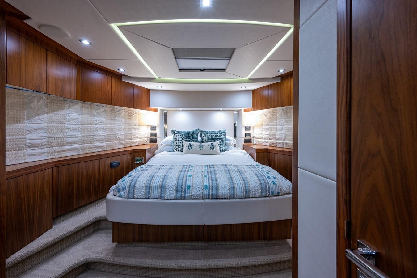 a bed in a room aboard 212 Yacht for Sale