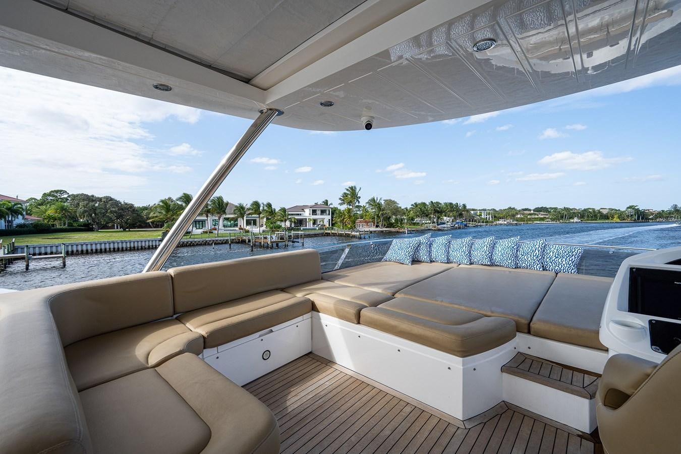a deck with a view of a city and water aboard 212 Yacht for Sale