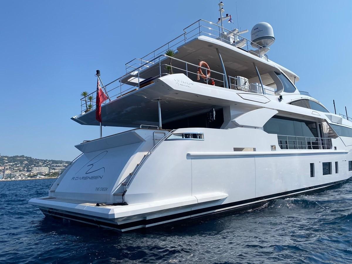 a large white boat on the water aboard GOLDEN LIFE Yacht for Sale
