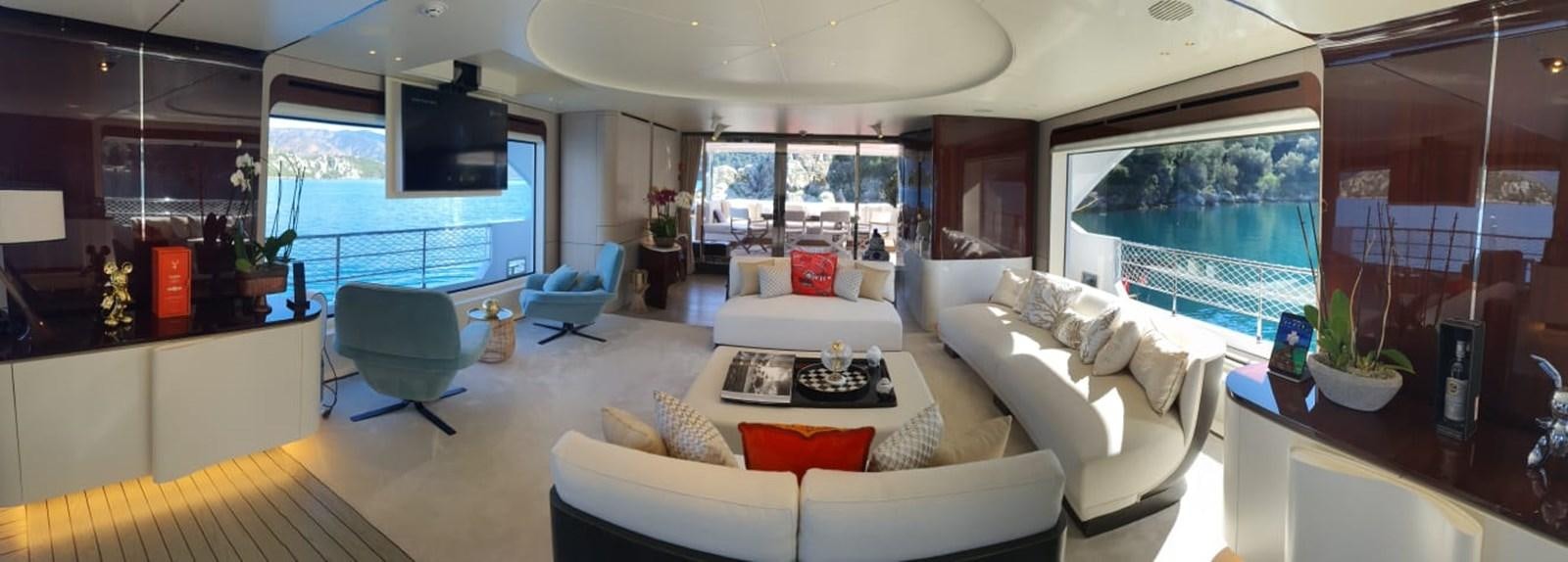 a living room with a large window aboard GOLDEN LIFE Yacht for Sale