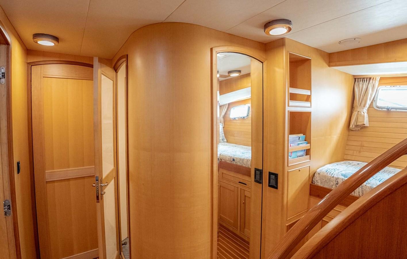 a room with wooden cabinets aboard SOMEDAY CAME Yacht for Sale