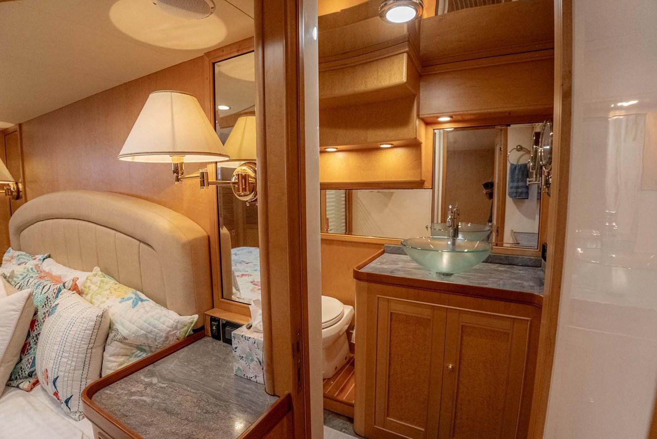 a bathroom with a sink and a mirror aboard SOMEDAY CAME Yacht for Sale