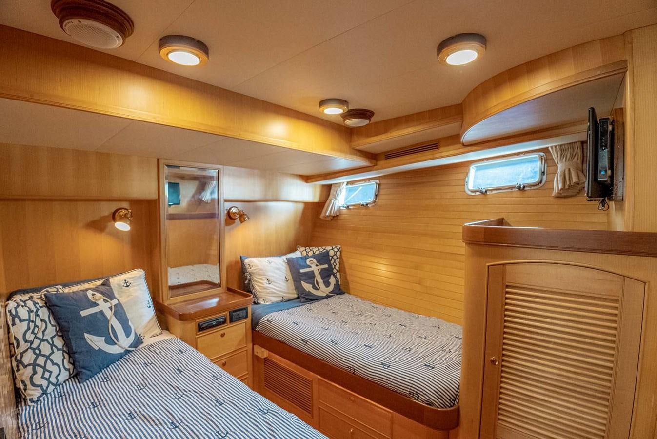 a room with two beds aboard SOMEDAY CAME Yacht for Sale