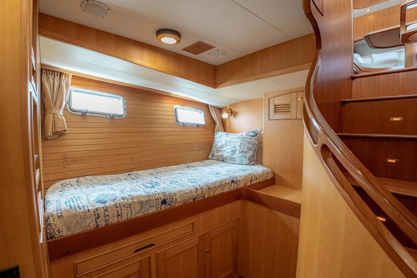 a bed in a room aboard SOMEDAY CAME Yacht for Sale