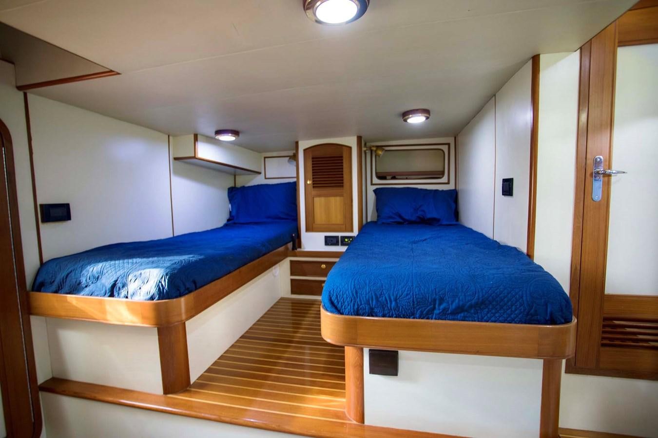 a couple of beds in a room aboard SOMEDAY CAME Yacht for Sale