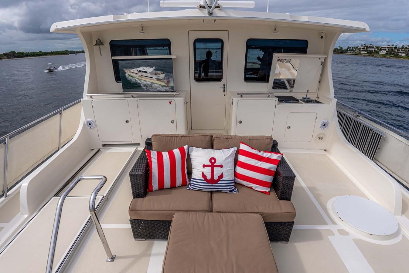 a boat with pillows on the deck aboard SOMEDAY CAME Yacht for Sale