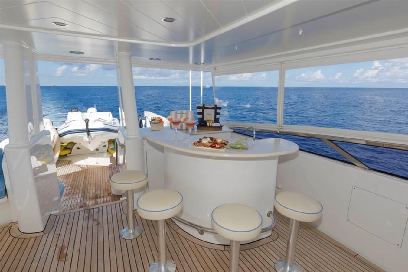 a large white room with a large window overlooking the ocean aboard NO NAME 112 Yacht for Sale