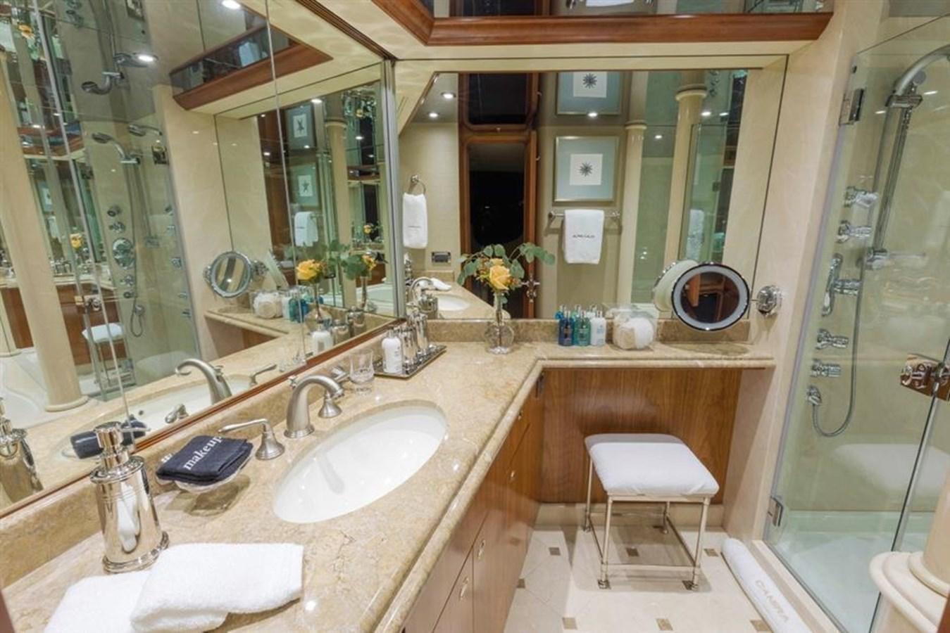 a bathroom with a large mirror aboard NO NAME 112 Yacht for Sale