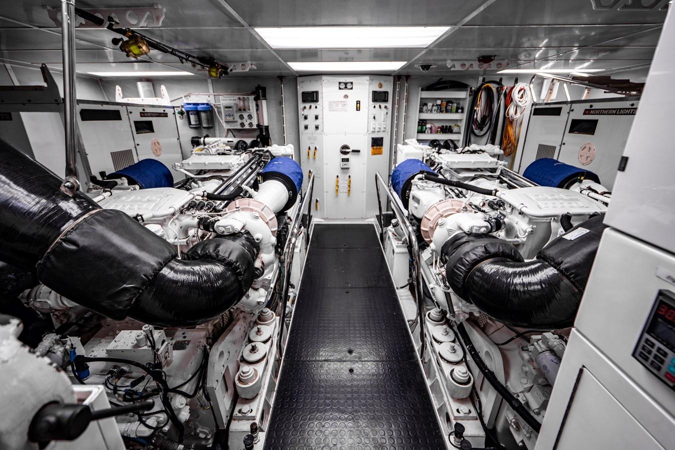 a room full of chairs aboard NO NAME 112 Yacht for Sale