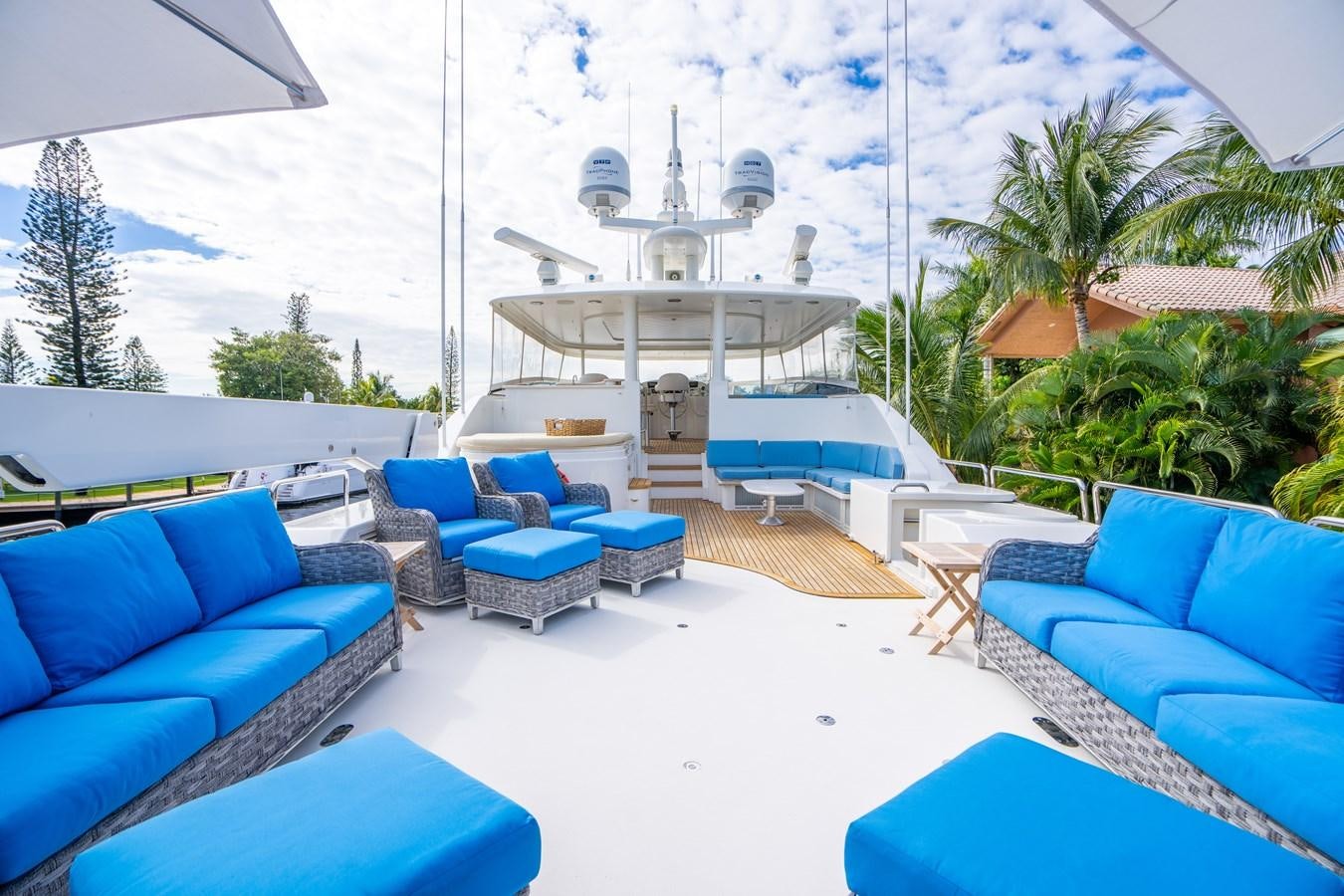 a swimming pool with lounge chairs and umbrellas aboard NO NAME 112 Yacht for Sale