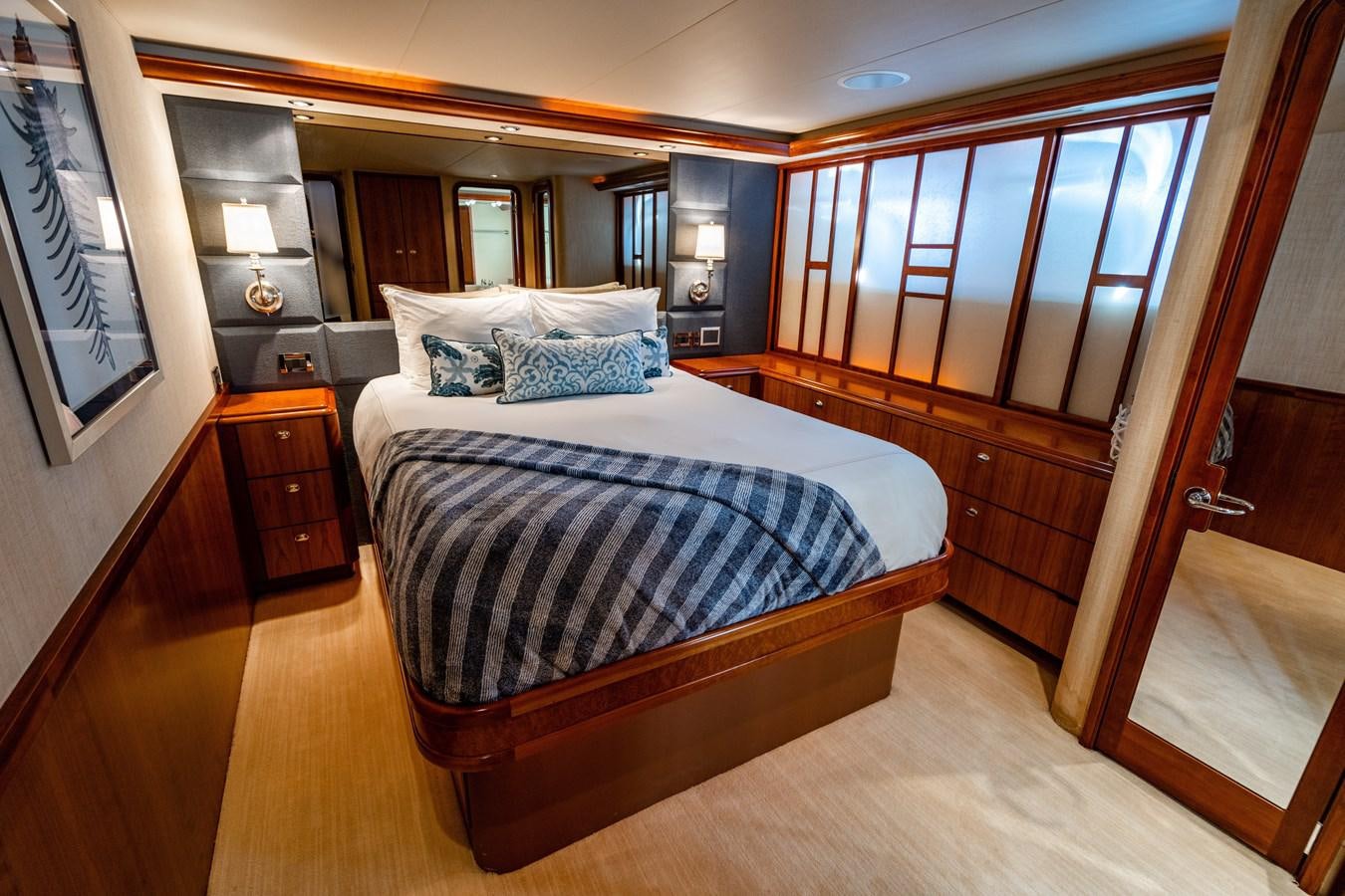 a bed in a room aboard NO NAME 112 Yacht for Sale