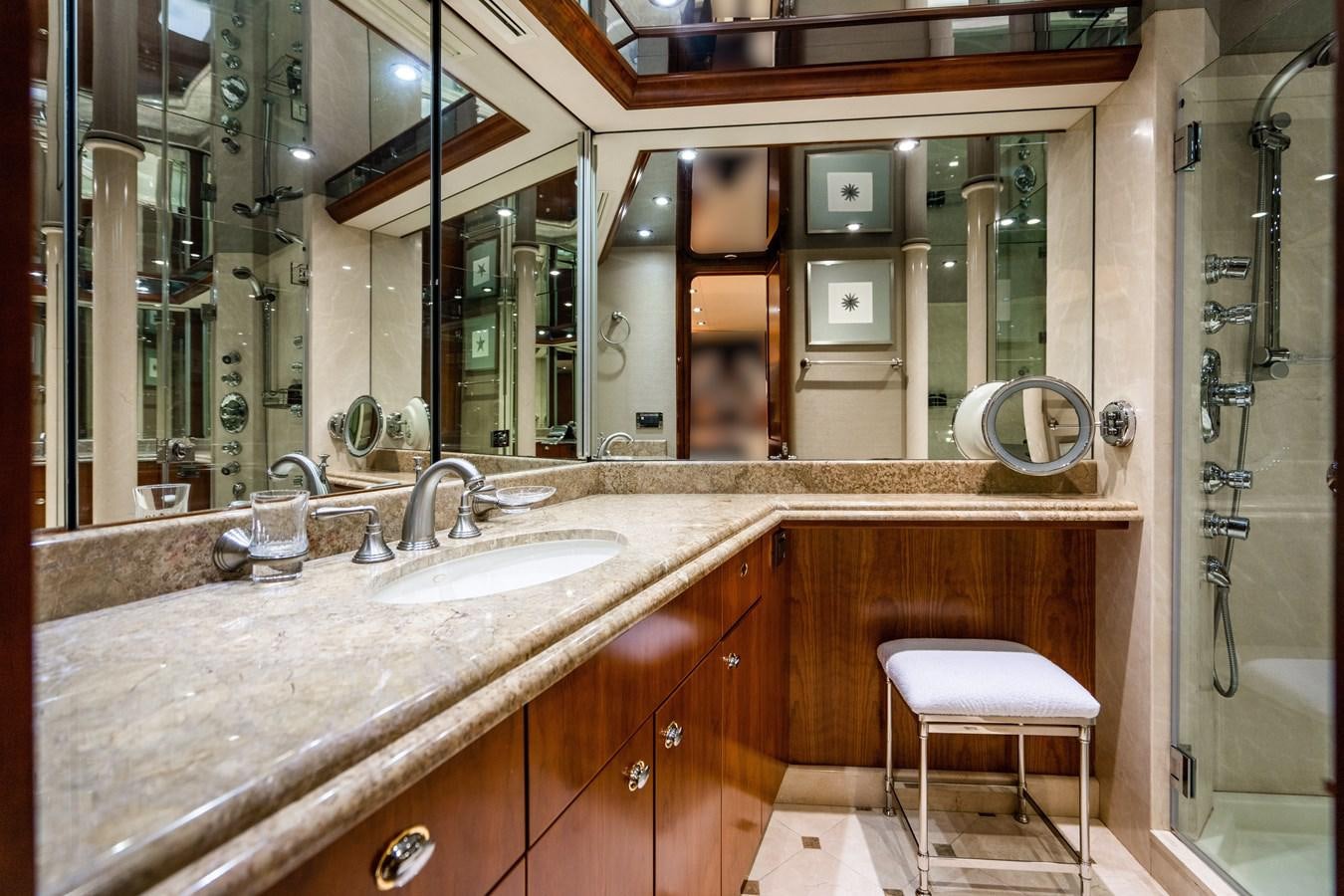 a bathroom with a large mirror aboard NO NAME 112 Yacht for Sale