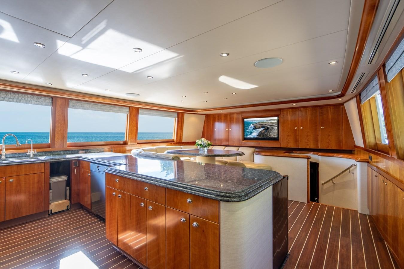 a large kitchen with wooden cabinets aboard NO NAME 112 Yacht for Sale