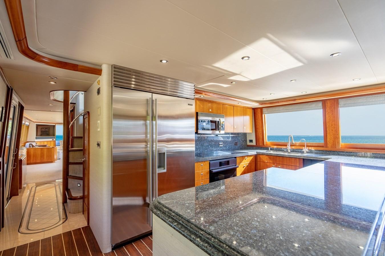 a kitchen with a large island aboard NO NAME 112 Yacht for Sale